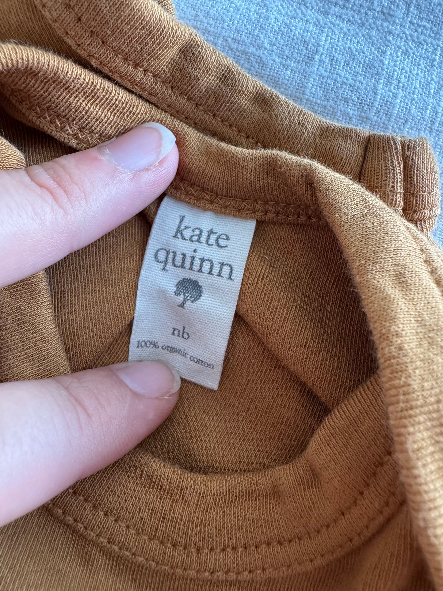 nb Kate Quinn Onesie
