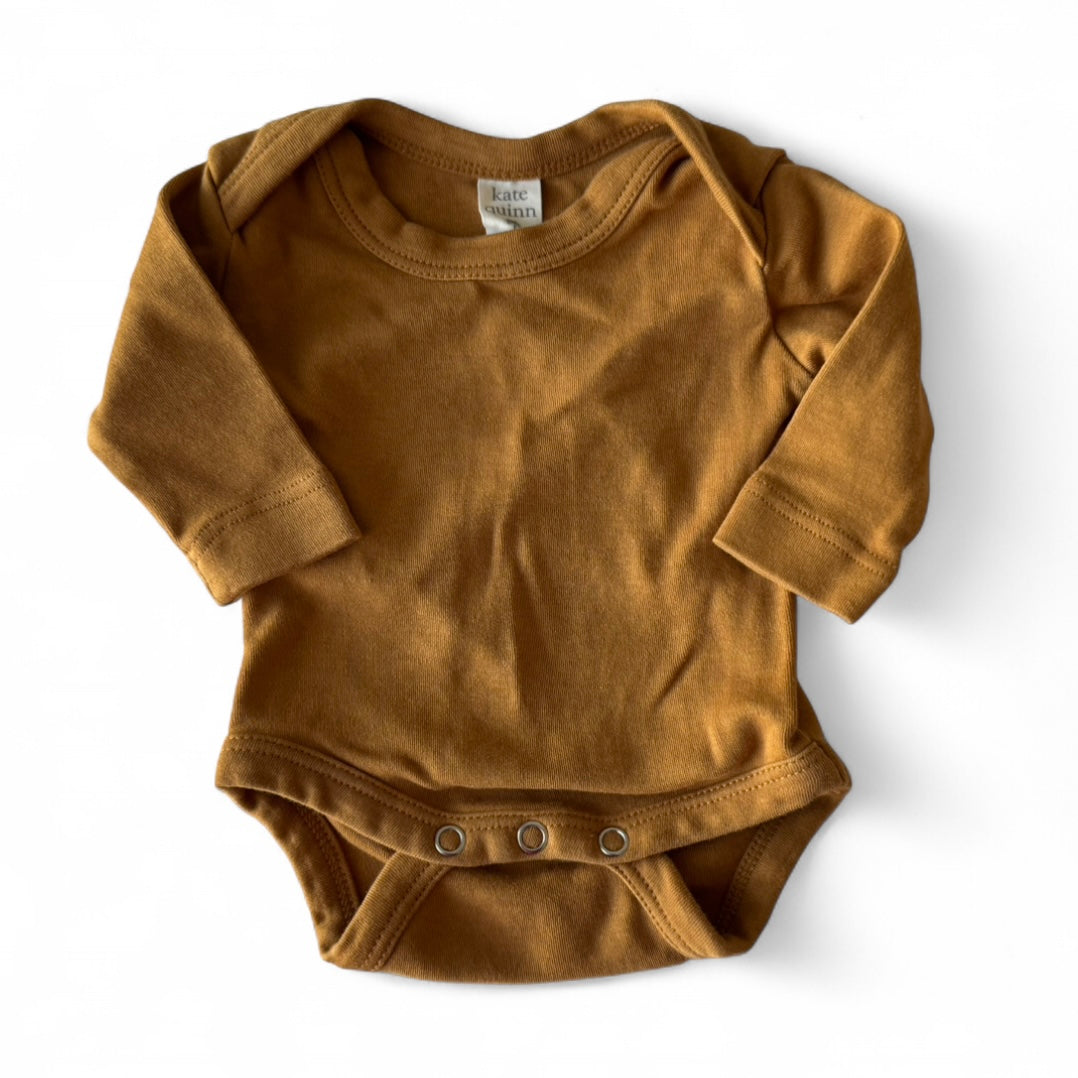 nb Kate Quinn Onesie